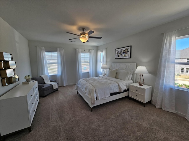 1836 Summer Aura, Mesquite, TX 75181 - bedroom with dark carpet, a ceiling fan, and baseboards