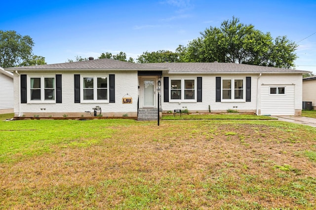 1318 N 61st St, Waco, TX 76710 - ranch-style house with a front lawn, entry steps, brick siding, and roof with shingles