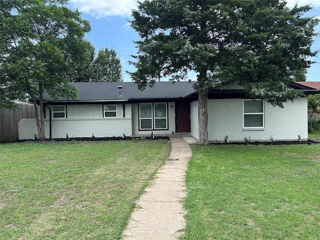 3837 Burning Tree Ln, Garland, TX 75042 - ranch-style home featuring brick siding and a shingled roof