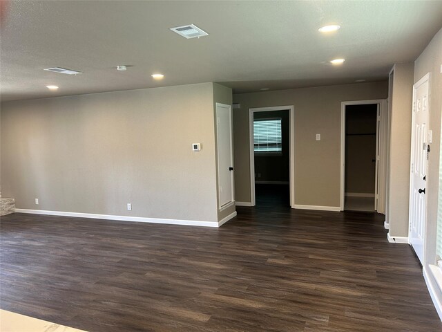 3837 Burning Tree Ln, Garland, TX 75042 - kitchen with a sink, appliances with stainless steel finishes, dark wood-style floors, decorative backsplash, and baseboards