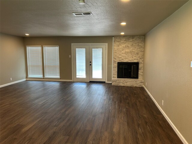 3837 Burning Tree Ln, Garland, TX 75042 - kitchen featuring appliances with stainless steel finishes, a sink, baseboards, dark wood finished floors, and recessed lighting