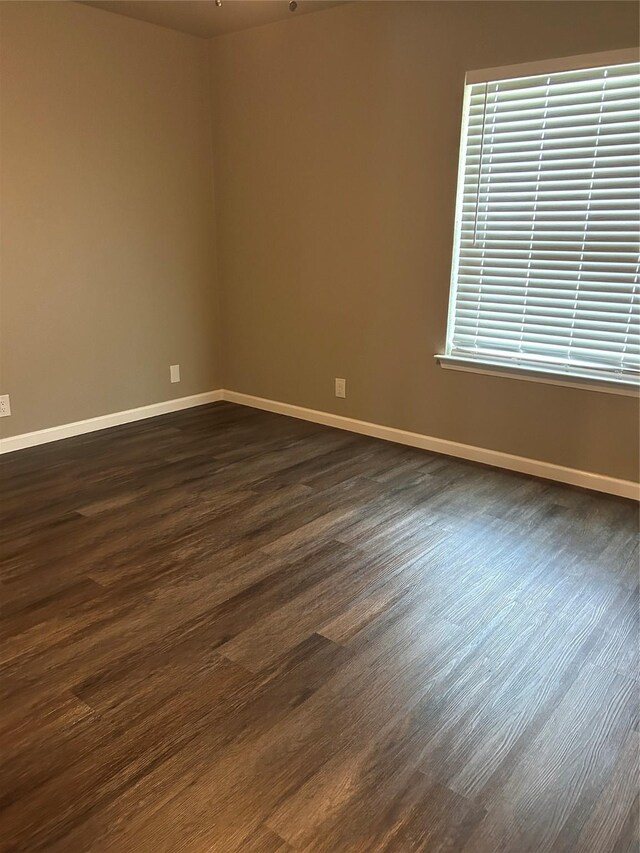 3837 Burning Tree Ln, Garland, TX 75042 - full bathroom with marble look tile flooring, vanity, toilet, and a shower