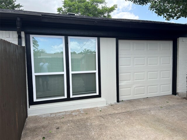 3837 Burning Tree Ln, Garland, TX 75042 - rear view of house with brick siding