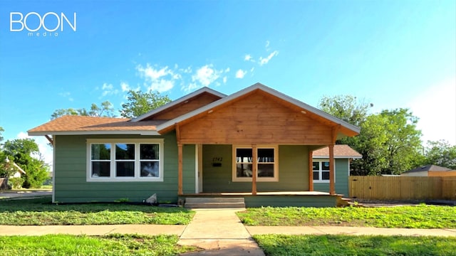 1742 S 5th St, Abilene, TX 79602 - bungalow-style house with covered porch and roof with shingles