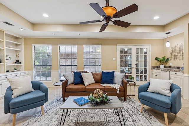1094 Edith Cir, Richardson, TX 75080 - living room with a tray ceiling, french doors, recessed lighting, and a ceiling fan