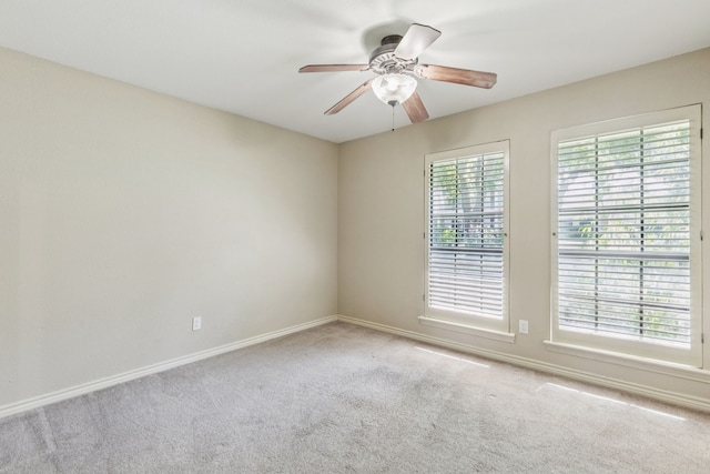 1094 Edith Cir, Richardson, TX 75080 - carpeted spare room with baseboards and ceiling fan