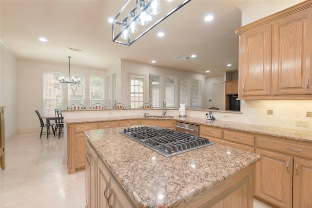 906 Glen Rose Dr, Allen, TX 75013 - kitchen featuring stainless steel appliances, a sink, a peninsula, a chandelier, and a center island