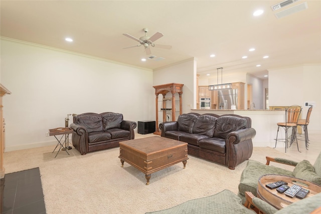 906 Glen Rose Dr, Allen, TX 75013 - living room with light colored carpet, crown molding, ceiling fan, recessed lighting, and baseboards