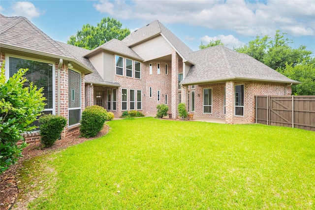 906 Glen Rose Dr, Allen, TX 75013 - back of property with brick siding and a shingled roof
