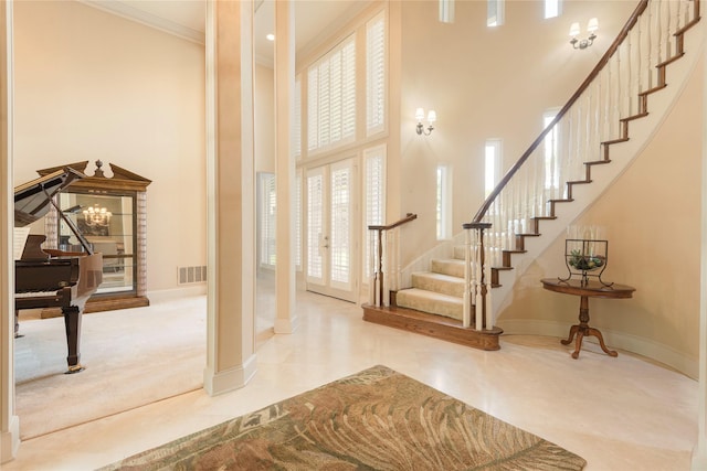 906 Glen Rose Dr, Allen, TX 75013 - entrance foyer featuring a high ceiling, stairway, ornamental molding, baseboards, and carpet