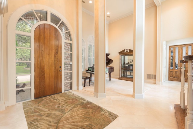 906 Glen Rose Dr, Allen, TX 75013 - entryway featuring a high ceiling, crown molding, baseboards, and recessed lighting