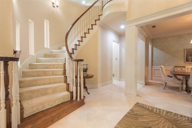906 Glen Rose Dr, Allen, TX 75013 - stairs with ornamental molding, decorative columns, and a high ceiling