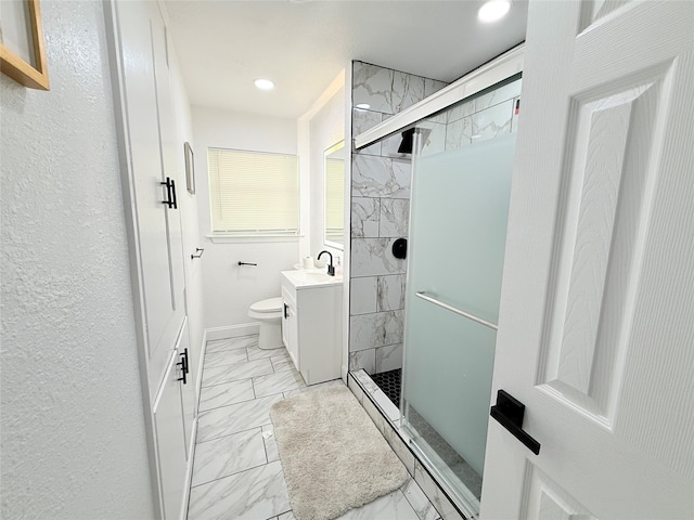 2138 Cambridge Dr, Irving, TX 75061 - bathroom featuring marble look tile flooring, a stall shower, vanity, toilet, and recessed lighting