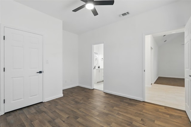 121 Collett Ct, Weatherford, TX 76088 - unfurnished bedroom featuring dark wood-style floors, baseboards, ensuite bath, and a ceiling fan