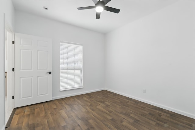 121 Collett Ct, Weatherford, TX 76088 - unfurnished room with a ceiling fan, dark wood-style floors, and baseboards