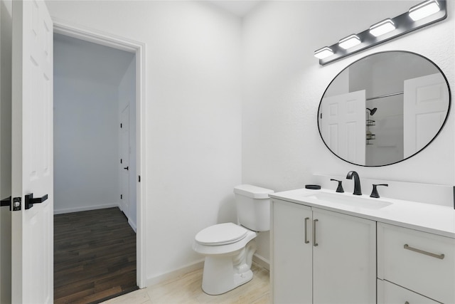 121 Collett Ct, Weatherford, TX 76088 - bathroom featuring vanity, wood finished floors, toilet, and baseboards