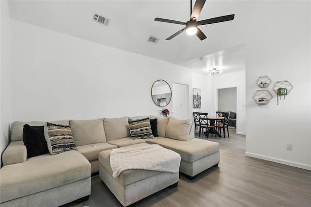 121 Collett Ct, Weatherford, TX 76088 - living area with ceiling fan, wood finished floors, and baseboards