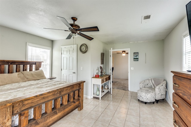 409 N Arizona, Celina, TX 75009 - bedroom with light tile patterned flooring, baseboards, and a ceiling fan