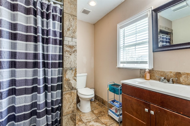 409 N Arizona, Celina, TX 75009 - bathroom with toilet, vanity, and curtained shower