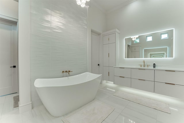 121 Sawgrass Dr, Heath, TX 75032 - bathroom with a freestanding bath, vanity, and crown molding