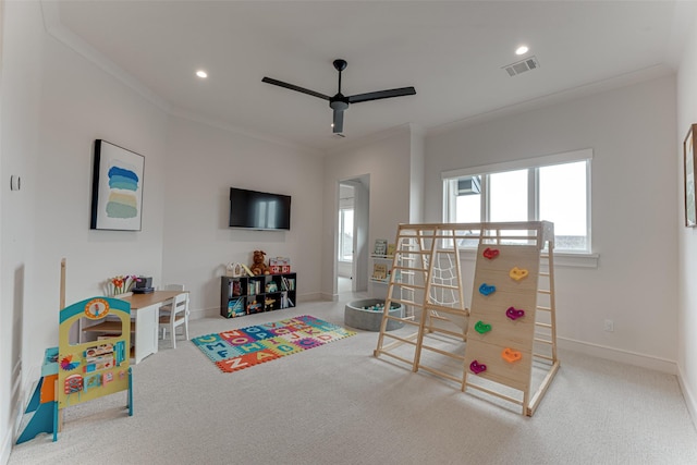 121 Sawgrass Dr, Heath, TX 75032 - recreation room with healthy amount of natural light, a ceiling fan, carpet floors, crown molding, and recessed lighting
