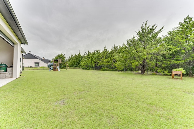 121 Sawgrass Dr, Heath, TX 75032 - fenced backyard featuring a playground