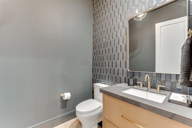 121 Sawgrass Dr, Heath, TX 75032 - bathroom featuring decorative backsplash, vanity, and tile walls