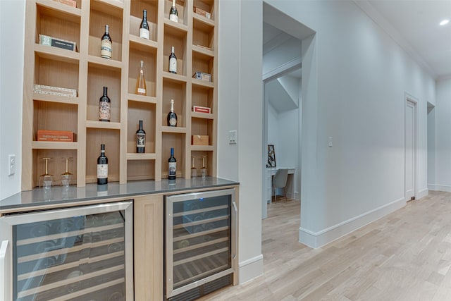 121 Sawgrass Dr, Heath, TX 75032 - indoor dry bar with wine cooler, light wood-style flooring, and ornamental molding