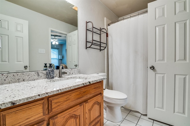 7227 N Stone Meadow Cir, Rowlett, TX 75088 - bathroom featuring tile patterned flooring, toilet, vanity, a ceiling fan, and a shower with shower curtain