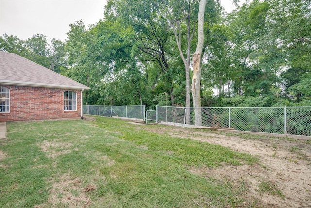 7227 N Stone Meadow Cir, Rowlett, TX 75088 - view of yard with view of wooded area