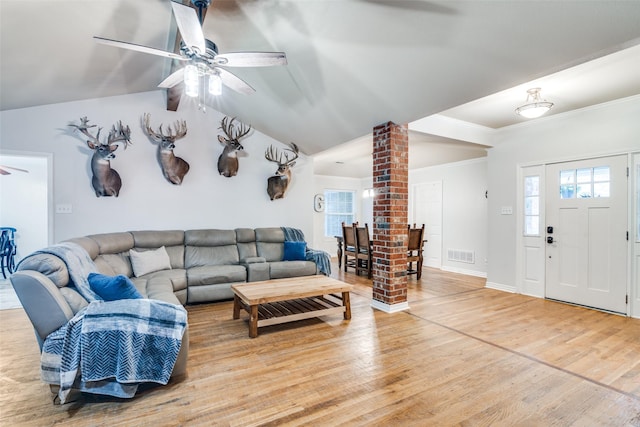 7227 N Stone Meadow Cir, Rowlett, TX 75088 - living area featuring ceiling fan, light wood-style floors, decorative columns, lofted ceiling, and baseboards