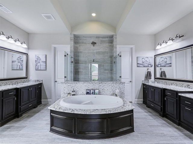 3644 Benchmark Ln, Frisco, TX 75034 - bathroom with a stall shower, two vanities, a bath, and tile patterned floors