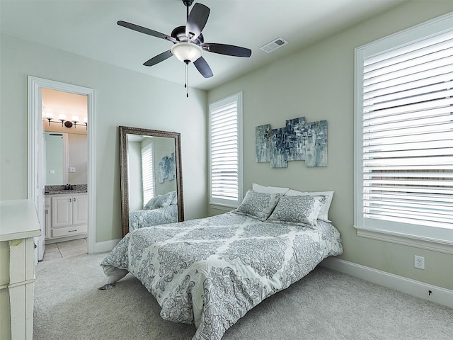 3644 Benchmark Ln, Frisco, TX 75034 - bedroom featuring light carpet, ensuite bath, and ceiling fan