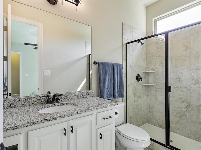 3644 Benchmark Ln, Frisco, TX 75034 - full bathroom featuring vanity, a shower stall, and a ceiling fan