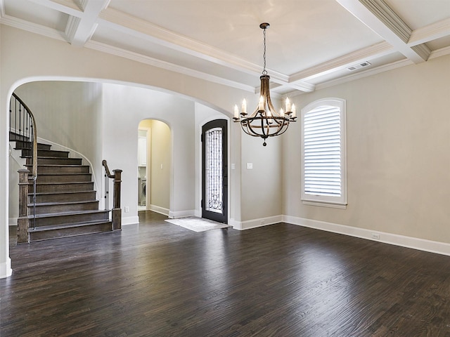3644 Benchmark Ln, Frisco, TX 75034 - entryway with coffered ceiling, a chandelier, dark wood-style floors, arched walkways, and ornamental molding
