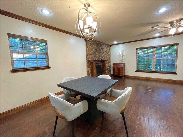 1635 W Pentagon Pkwy, Dallas, TX 75224 - dining space featuring crown molding, a stone fireplace, wood finished floors, a ceiling fan, and baseboards