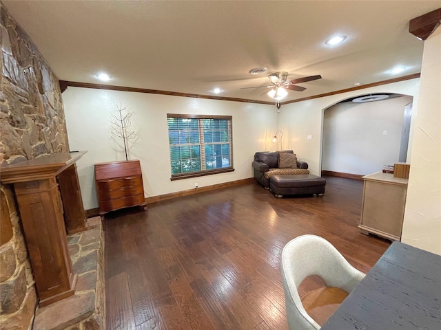 1635 W Pentagon Pkwy, Dallas, TX 75224 - sitting room featuring a ceiling fan, crown molding, wood finished floors, arched walkways, and baseboards