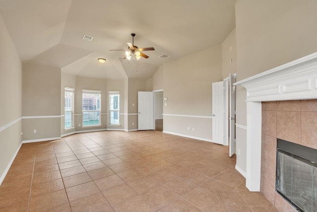 1418 E Oates Rd, Garland, TX 75043 - unfurnished living room with a fireplace, light tile patterned flooring, a ceiling fan, lofted ceiling, and baseboards