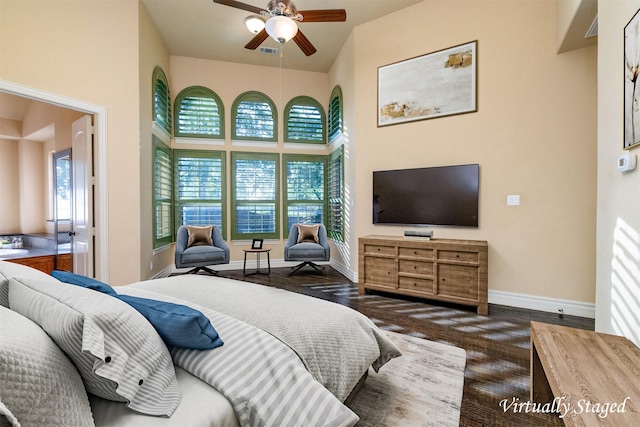 437 Monarch Hill Ct, Keller, TX 76248 - bedroom featuring baseboards, dark wood-style floors, a towering ceiling, and a ceiling fan
