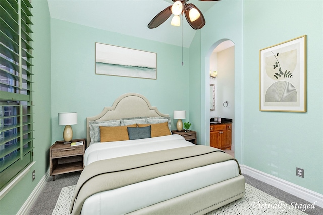 437 Monarch Hill Ct, Keller, TX 76248 - carpeted bedroom featuring arched walkways, baseboards, and ensuite bathroom