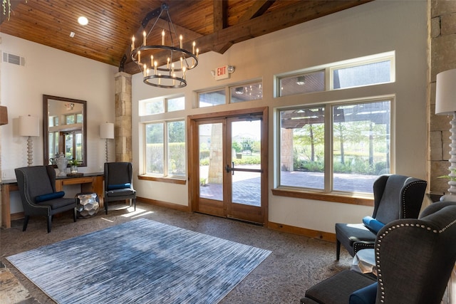 437 Monarch Hill Ct, Keller, TX 76248 - sitting room with carpet floors, wooden ceiling, a high ceiling, a chandelier, and baseboards