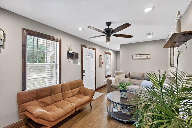 2226 Varsity Dr, Grand Prairie, TX 75051 - living area featuring plenty of natural light, ceiling fan, wood finished floors, baseboards, and recessed lighting