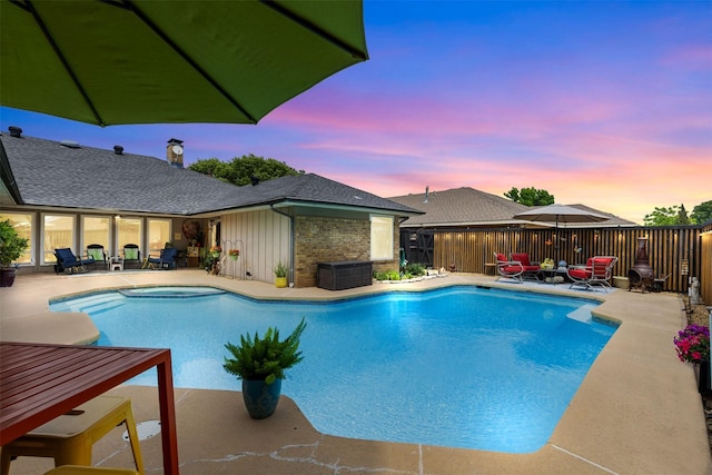 3616 Wandering Trl, Plano, TX 75075 - pool at dusk featuring a patio area