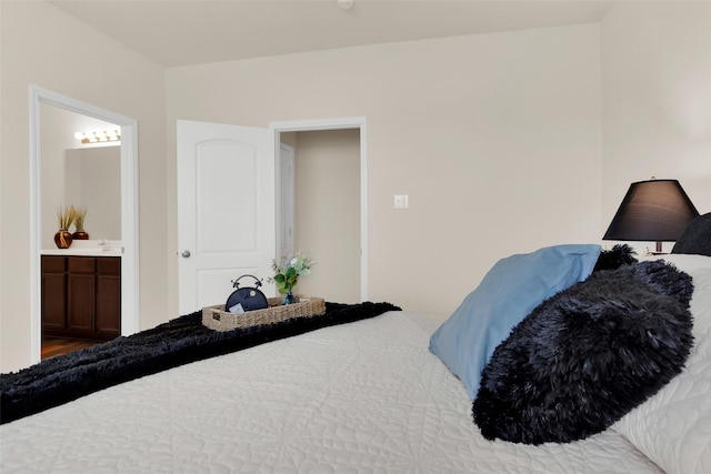 1303 Clegg St, Howe, TX 75459 - bedroom featuring ensuite bath, wood finished floors, and a sink