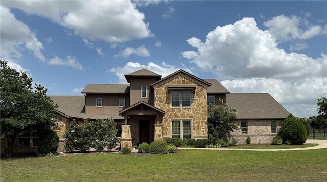321 Bear Country Dr, Aledo, TX 76008 - craftsman house featuring board and batten siding, stone siding, and a front yard