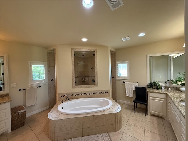 321 Bear Country Dr, Aledo, TX 76008 - bathroom with a garden tub, vanity, a walk in shower, tile patterned floors, and recessed lighting