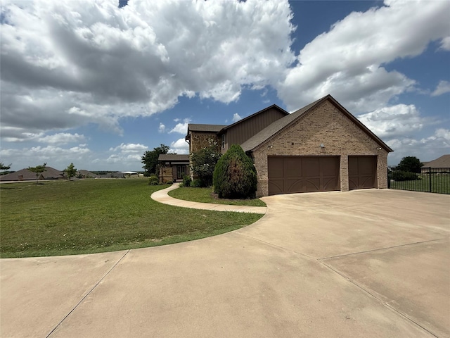 321 Bear Country Dr, Aledo, TX 76008 - view of side of property with an attached garage, brick siding, and driveway