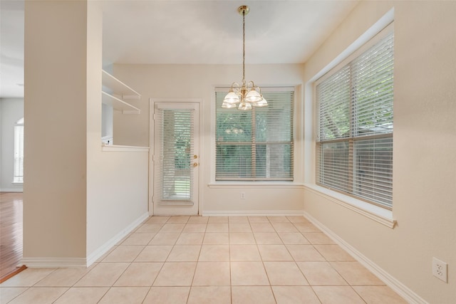 3232 Kent Dr, Flower Mound, TX 75022 - unfurnished dining area with a chandelier and tile patterned floors