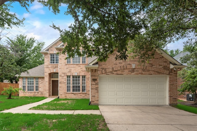 3232 Kent Dr, Flower Mound, TX 75022 - traditional-style house featuring brick siding, concrete driveway, and an attached garage