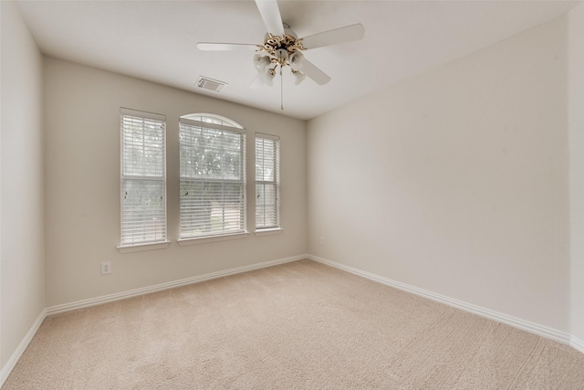 3232 Kent Dr, Flower Mound, TX 75022 - spare room with light colored carpet and a ceiling fan